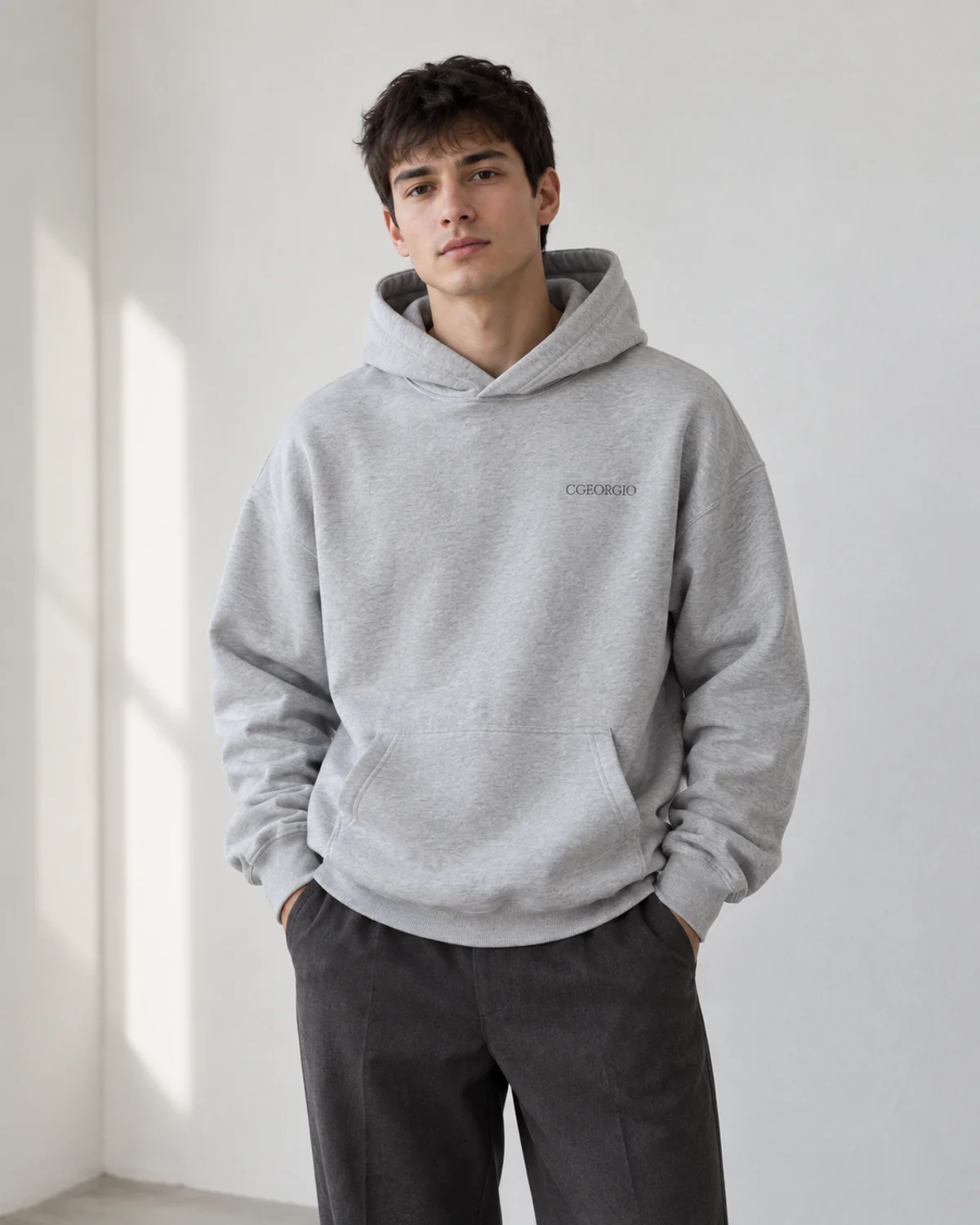 CGEORGIO marl grey oversized hoodie styled with plain charcoal trousers
